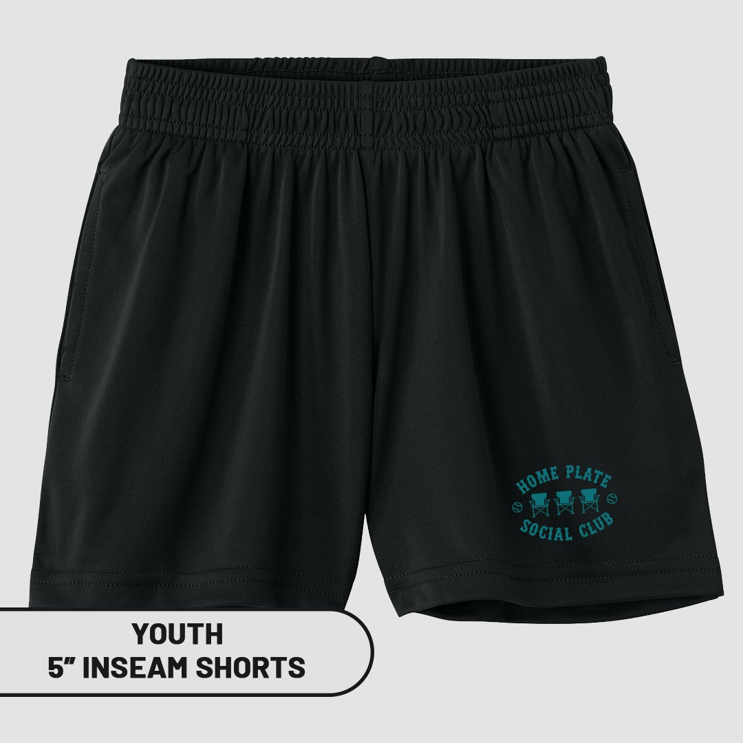 Black youth athletic shorts with "Home Plate Social Club" logo and text.